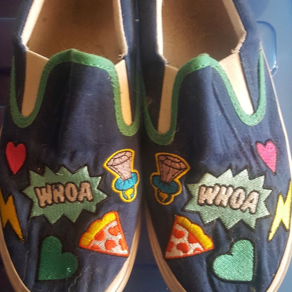 Blue slip on kids sneakers with fun design